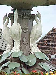 Herons at the top of the fountain